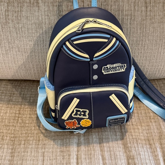 Disney Monsters University varsity jacket Navy and Cream Backpack 10 x 8 - Picture 10 of 10